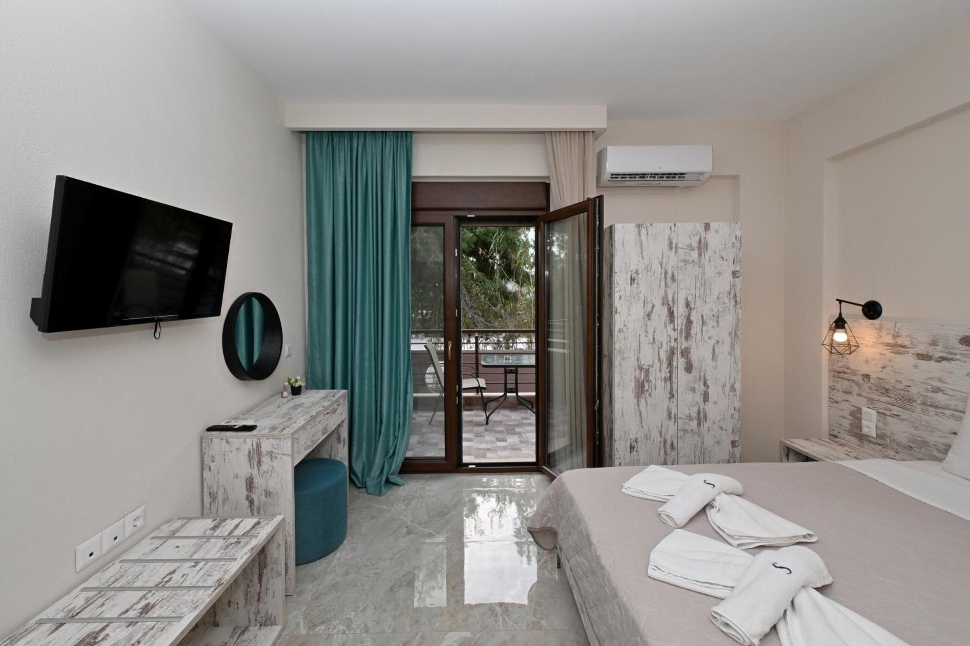 Sinodinos Deluxe Apartments Afytos Eksteriør bilde